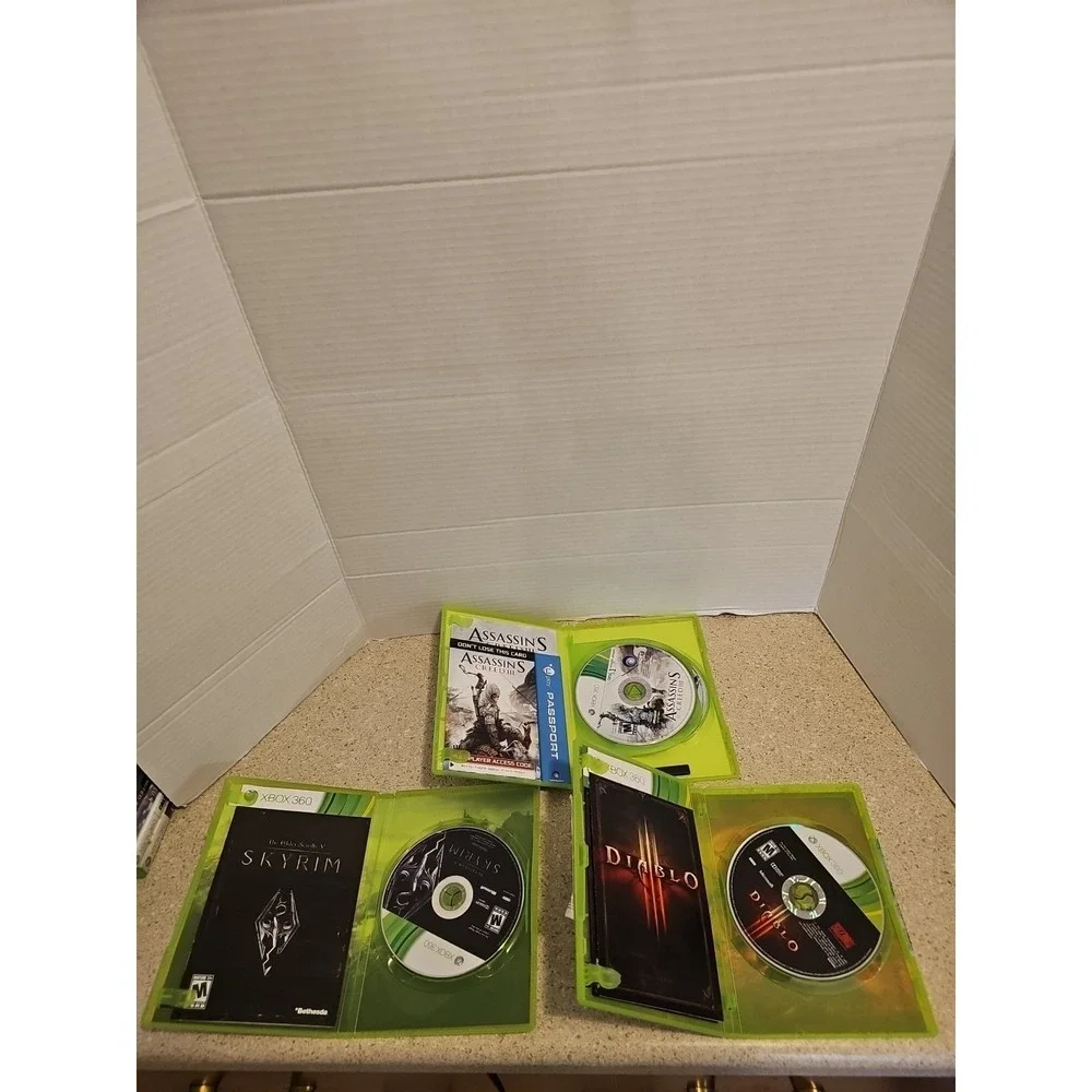 xbox 360 diablo, skyrim and assassins creed 3